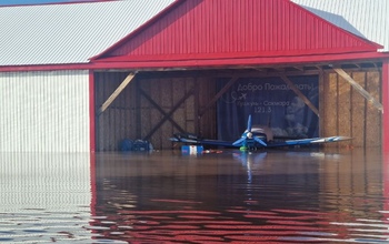 В поселке Кушкуль большая вода затопила аэродром и подходит к домам