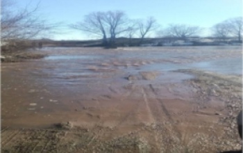 В Александровском районе подтопило низководный мост