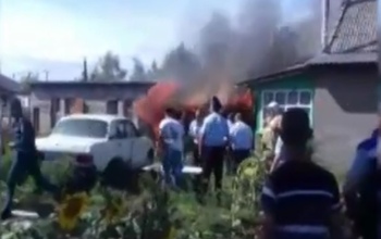 В Беляевке полицейские спасли от пожара соседствующий с отделением дом