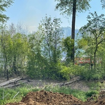 На пожар в районе поселка 9 Января сброшено около 200 тонн воды