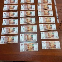 В Сорочинске мужчина положил 100 000 рублей в ежедневник полицейского