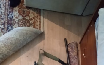 У жителя Октябрьского района изъяли крупную партию наркотика и оружие с патронами