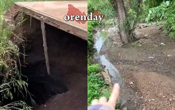 После ливня у жителей улицы Сахалинской во дворе образовался большой провал