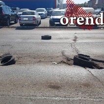 Слабо главе Оренбурга посчитать покрышки на разбитой улице Шоссейной?